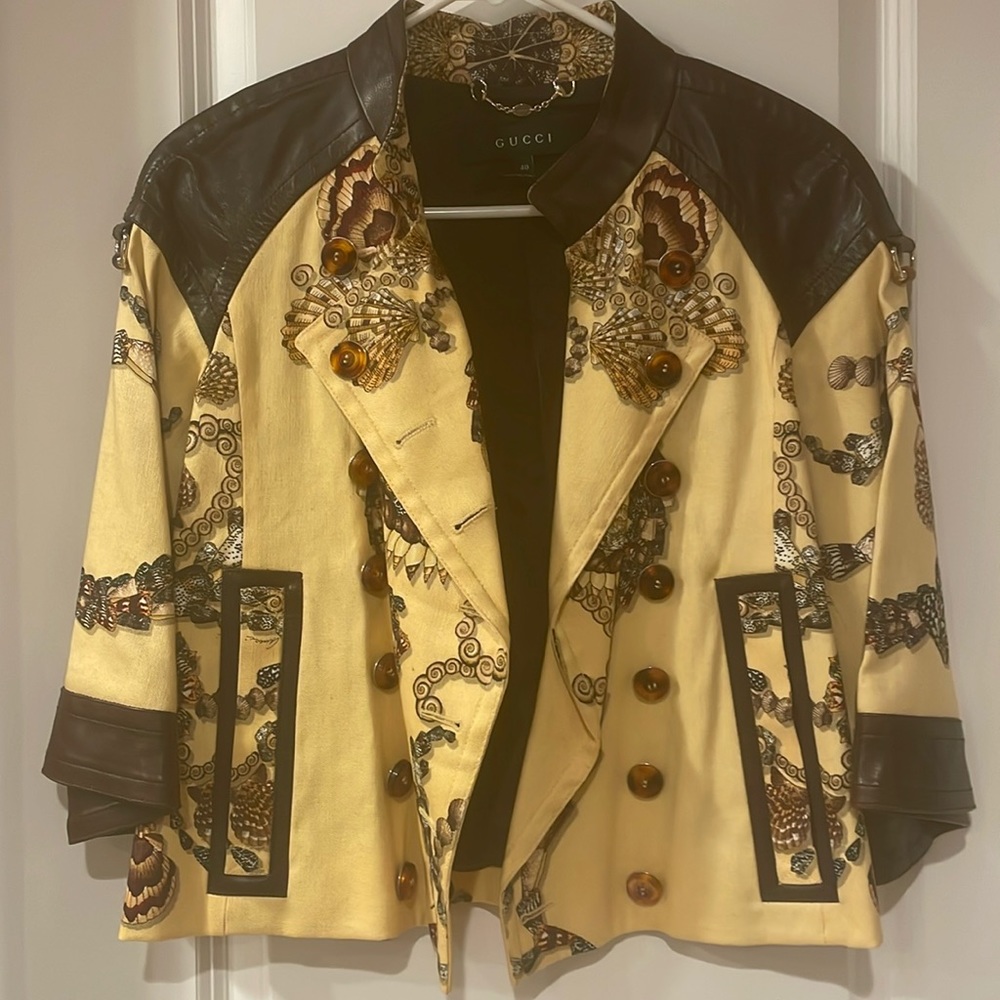 Woman’s Gucci sea shell jacket